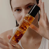 <tc>Nourishing oil with rose petals</tc>